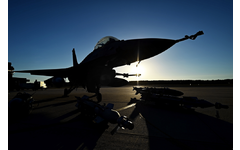 Fighter aircraft with ammunition and missiles on the runway