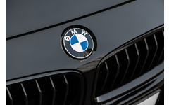 BMW logo on the front portion of a black car