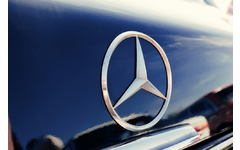 Close-up of Mercedes Benz logo -- one of Daimler's automobile brands