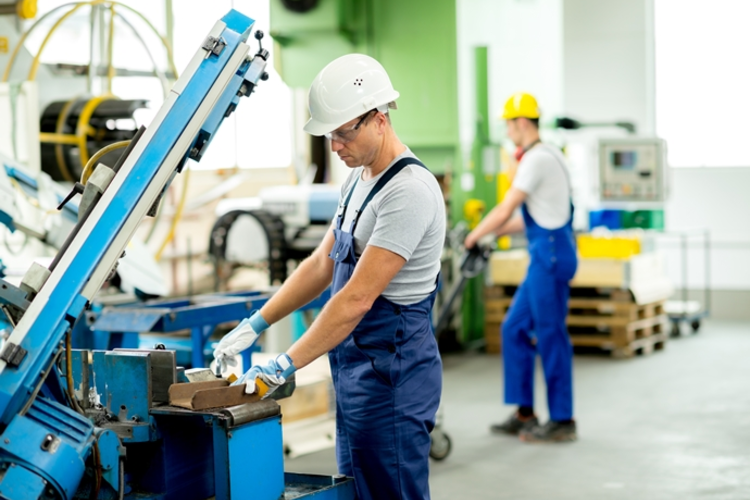 Manufacturing workers on the machine floor