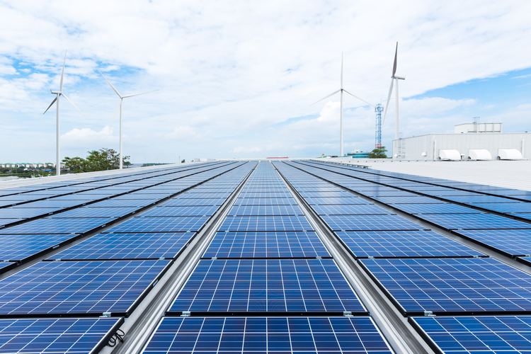 Solar panels on factory roof.