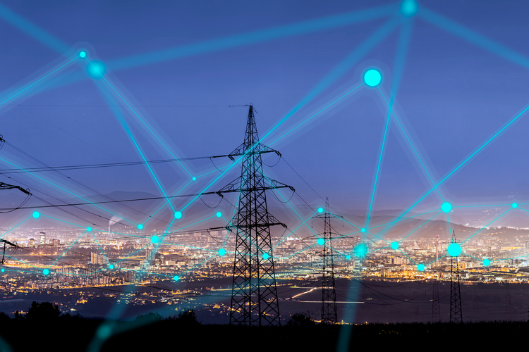 Power grid overlaid with graphics representing smart technologies