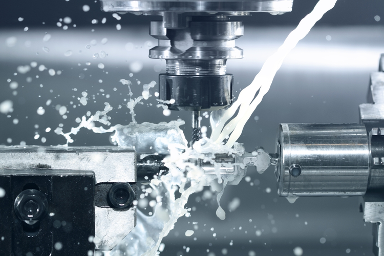 Close-up image of a CNC machine at work.