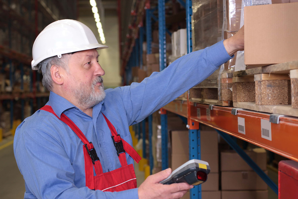 A worker scanning inventory.