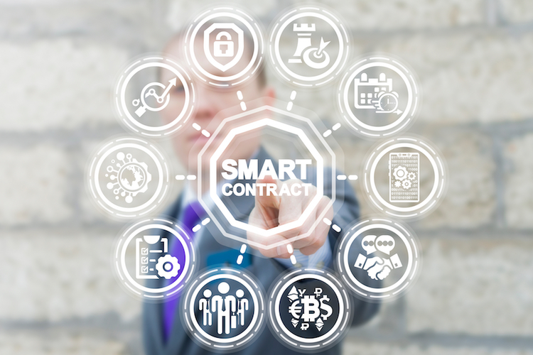 Man interacting with graphics representing Bitcoin-powered smart contracts