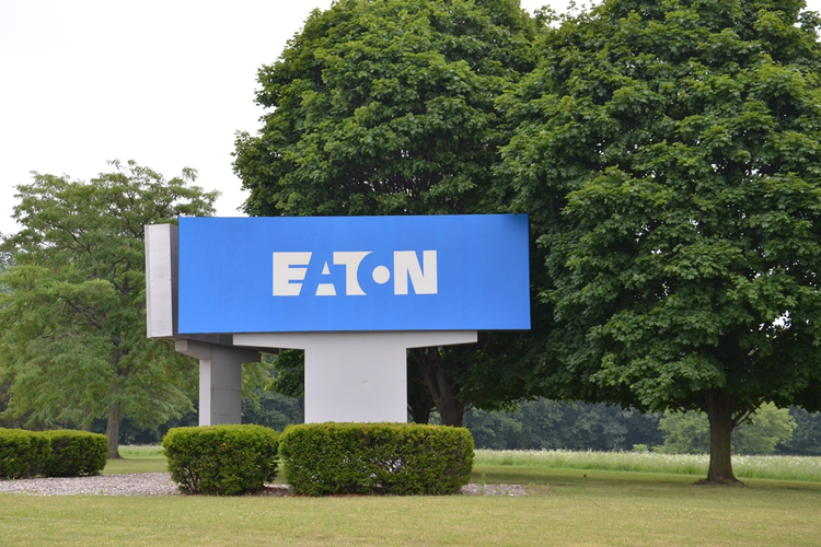 Eaton Corp. sign surrounded by trees and foliage