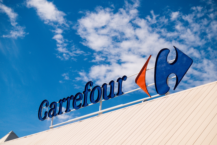 Carrefour signage against sky