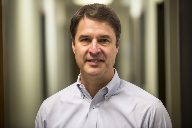 Headshot of Paul Ryznar - founder, president, and CEO of OPS Solutions
