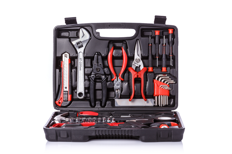 Open toolbox full of hand tools.