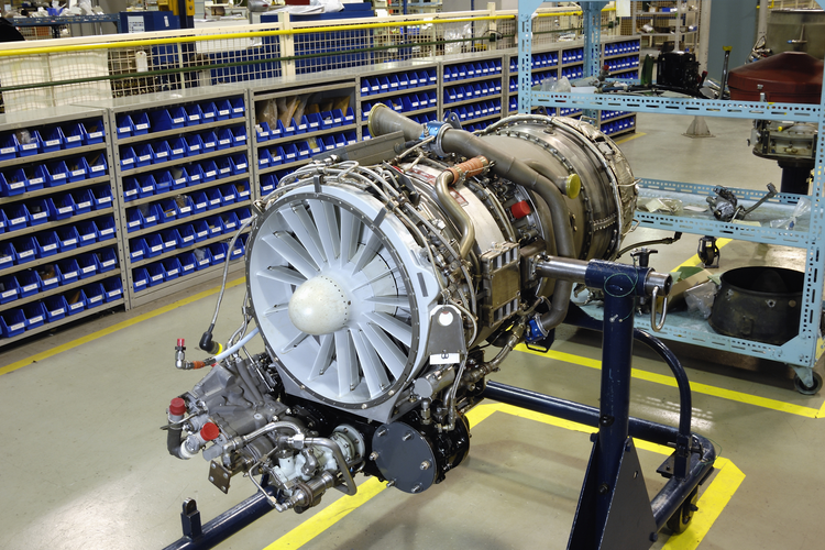 Aircraft engine on a stand in a manufacturing facility