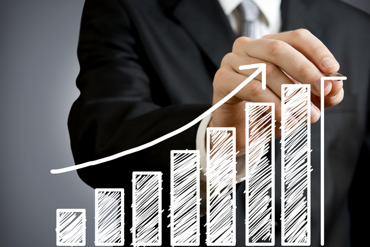 Business man drawing graph