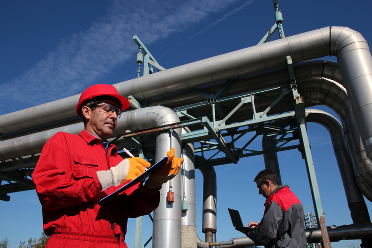 Industrial engineers working outside a factory