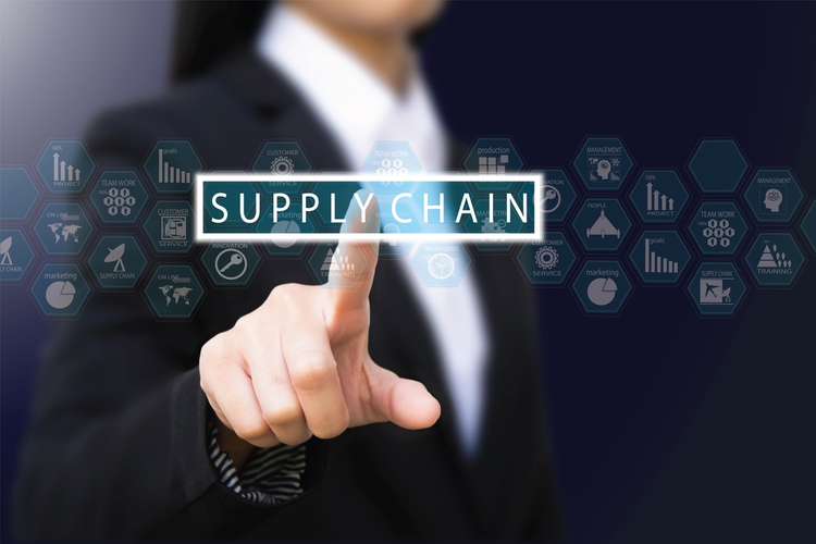 Business man touching supply chain icon.