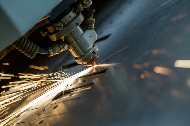 A close-up of laser cutting of metal sheet.