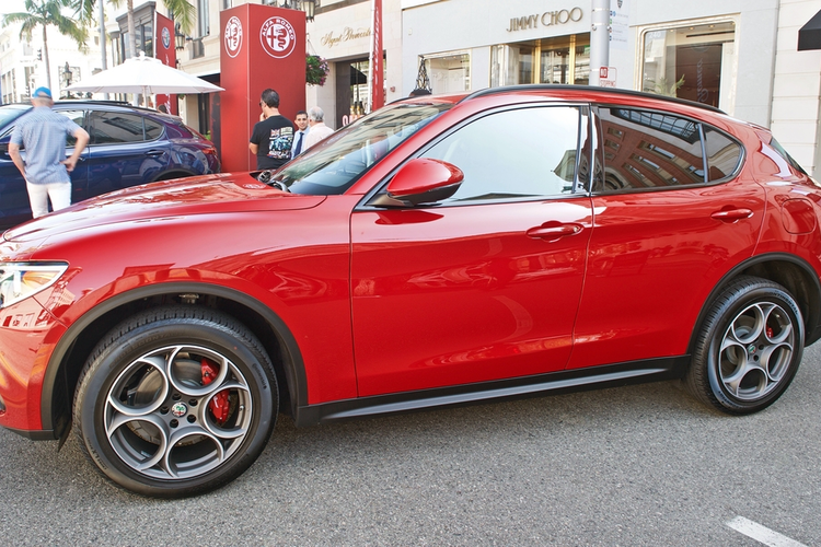 Red crossover utility vehicle (CUV).